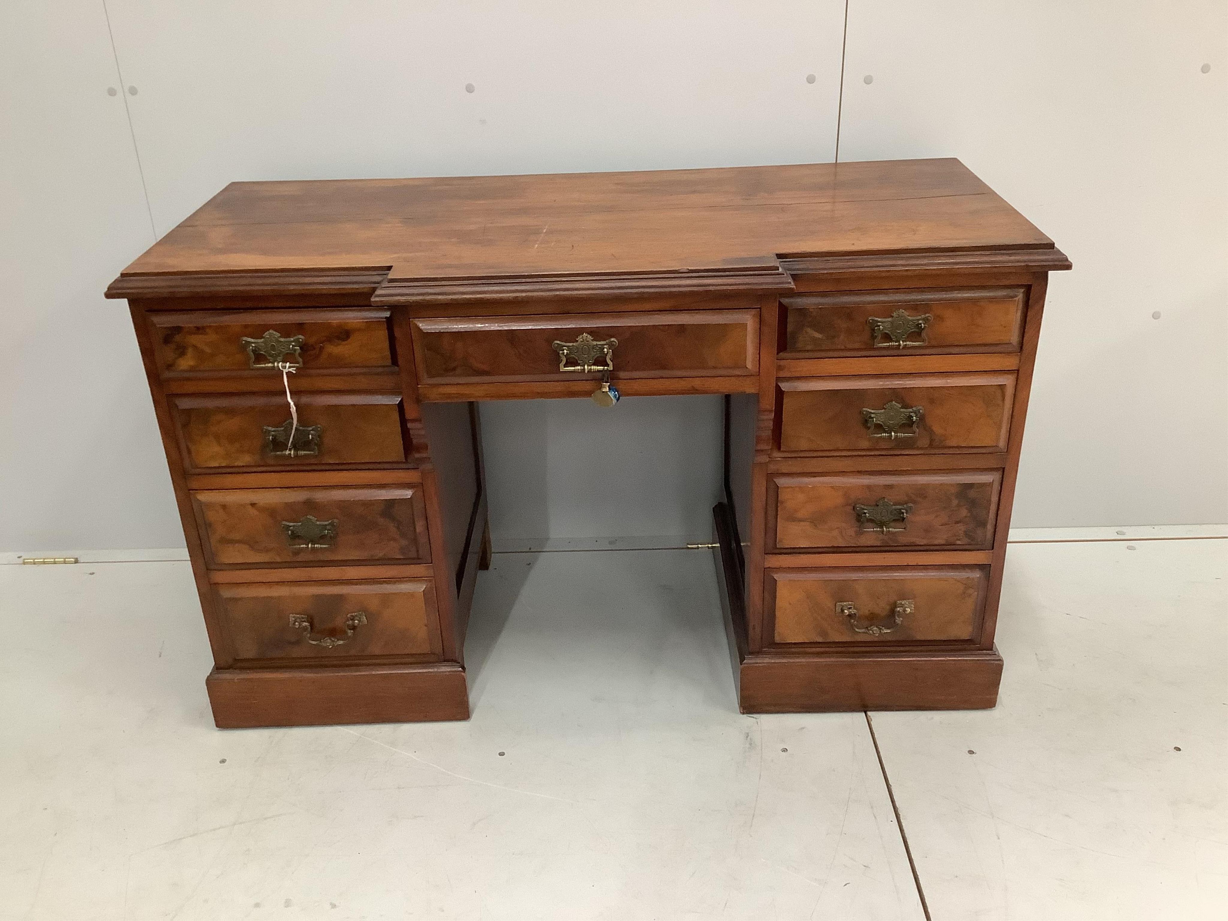 A late Victorian mahogany breakfront kneehole dressing table, width 124cm, depth 54cm, height 76cm. Condition - fair